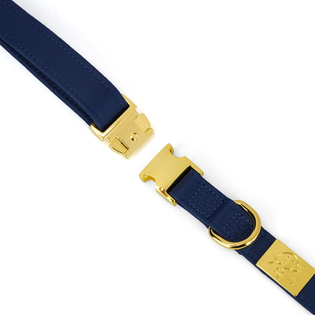Close-up of the TidyTails collar gold buckle, D-ring and logo