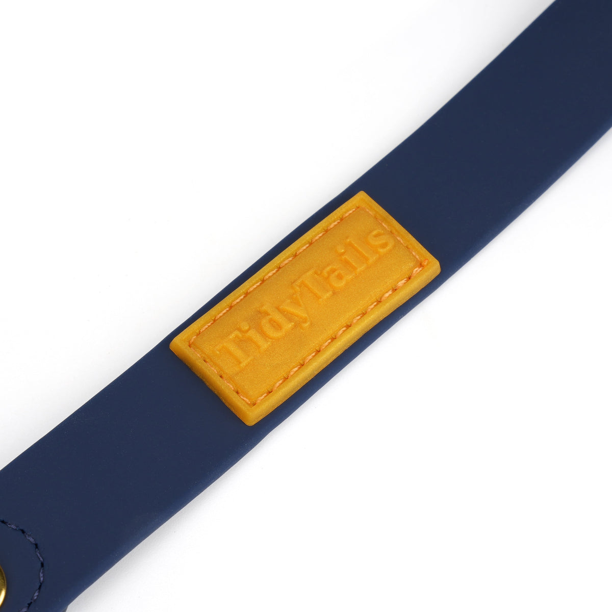 Close-up of the TidyTails logo on the navy everyday leash