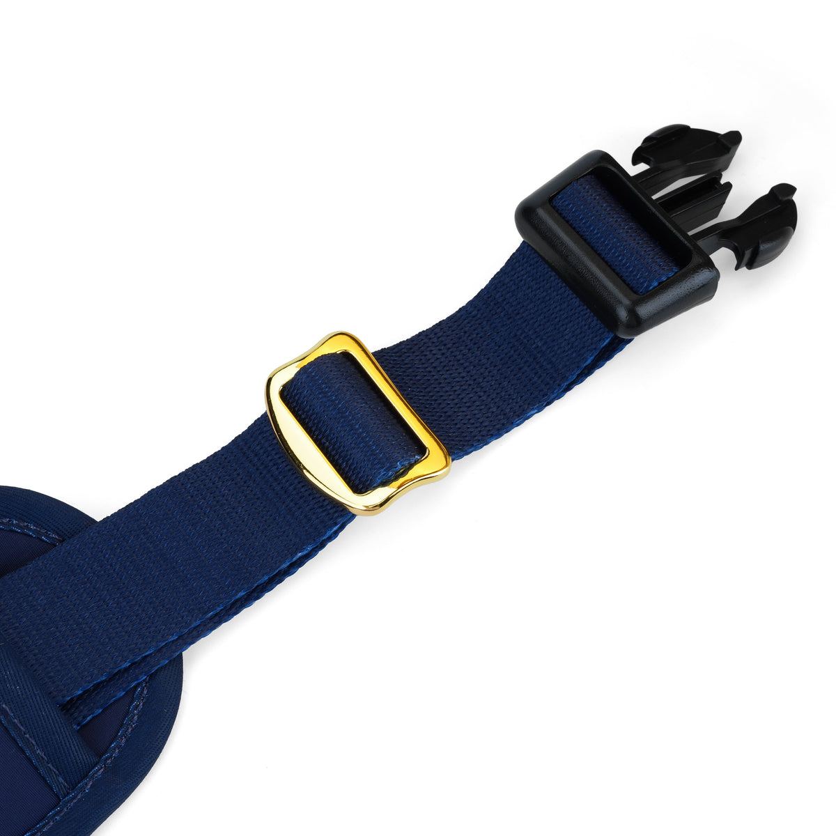 Close-up of the adjustable navy harness strap and hardware